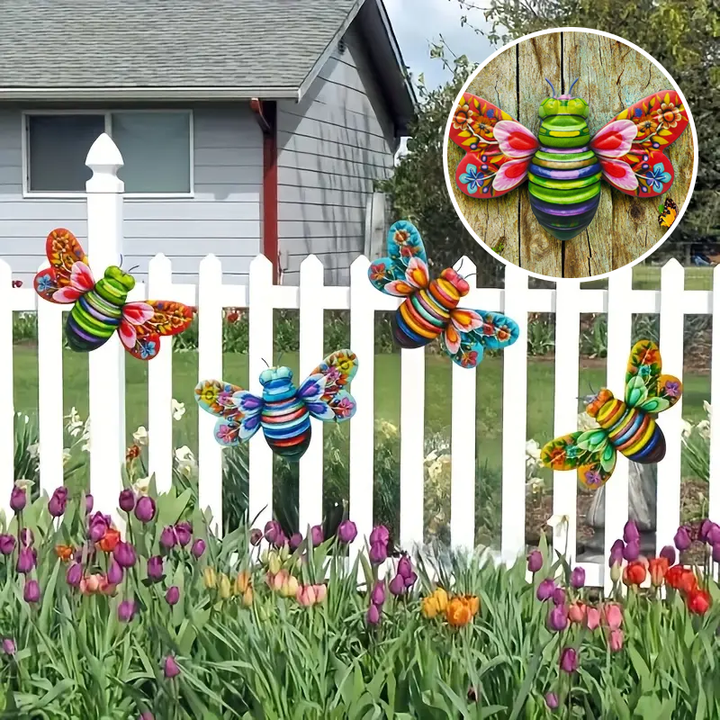 Close-up of a rustic metal bee wall hanging, showcasing its textured finish & craftsmanship.