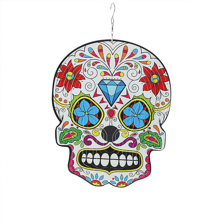 Sugar Skull Wind Spinner in a garden setting, beautiful outdoor home accent