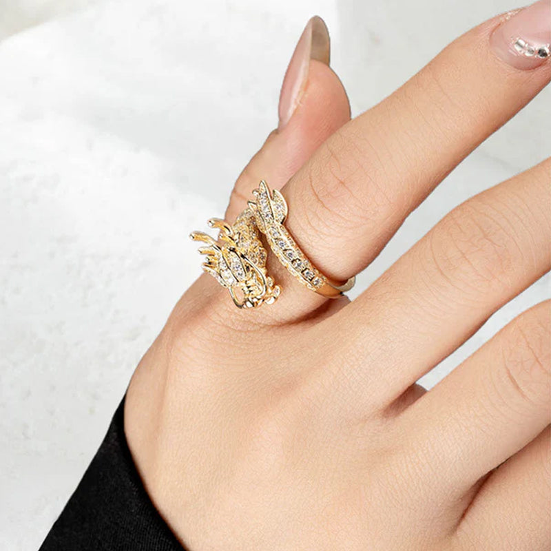 Womens gold-plated adjustable dragon ring with clear zirconia stones, a symbol of power