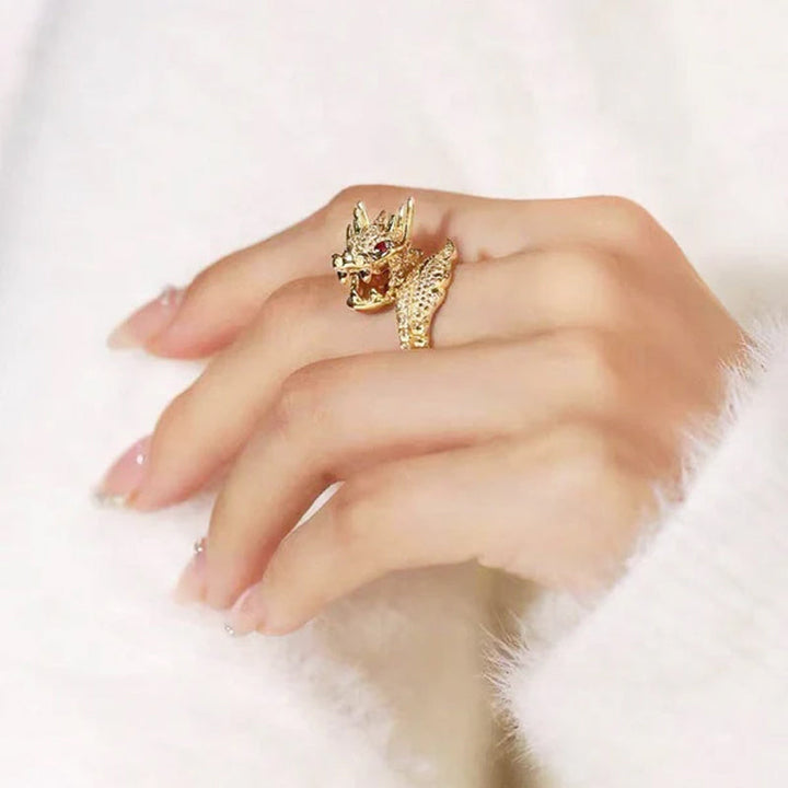 Intricate women's adjustable ring featuring a dragon motif and dazzling zirconia accents