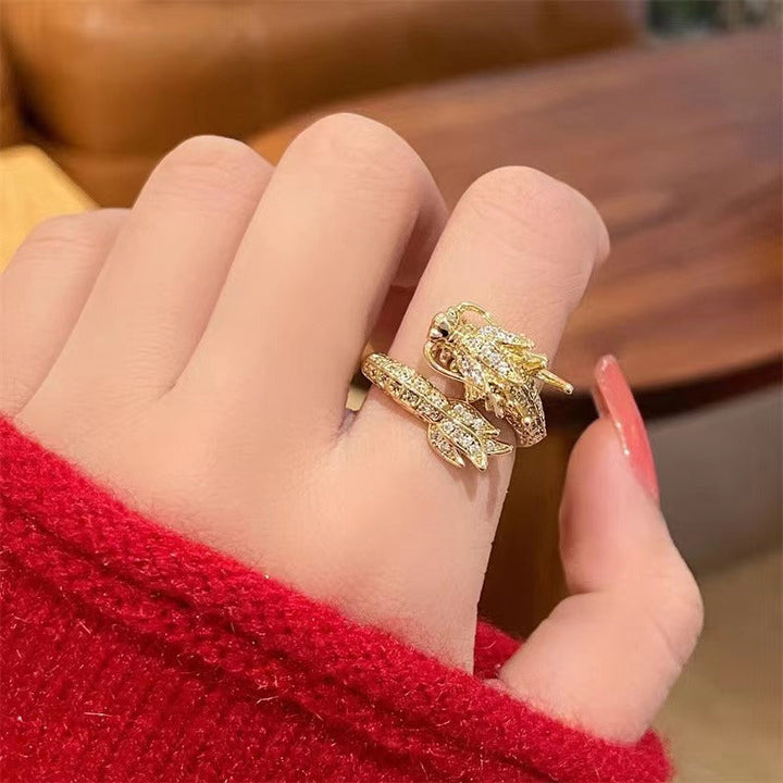 Fashionable adjustable ring for women, showcasing a mythical dragon and brilliant zirconia stones