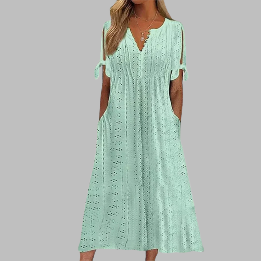 Elegant V-neck Boho Summer Midi Dress for women with practical pockets. Flowy, A-line silhouette, great for casual wear.