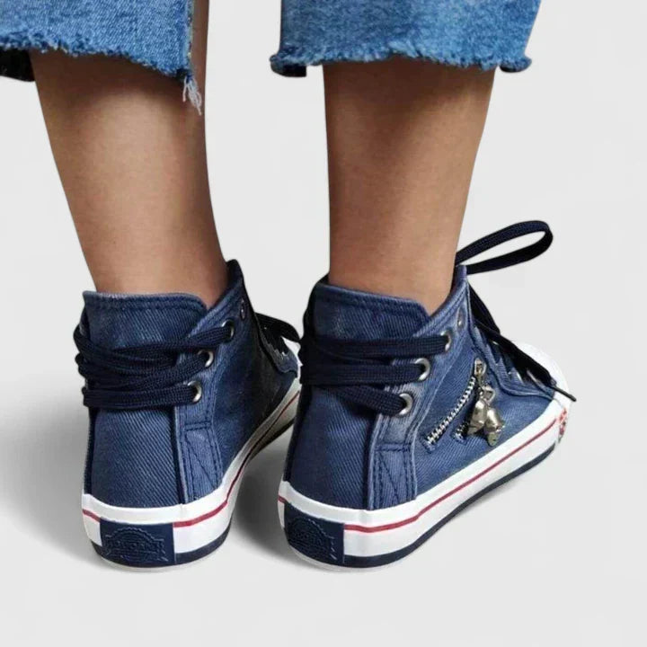 Stylish navy blue orthopedic flats for women, offering everyday arch support & foot pain relief.