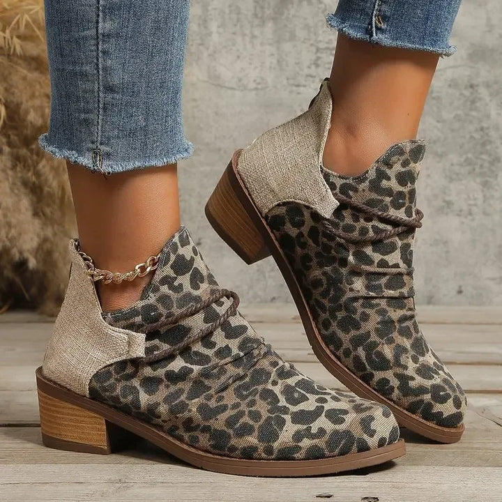Elegant women's leopard print woven textile boots, comfortable block heel for everyday.