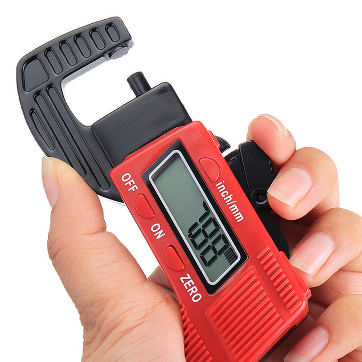 Handheld digital micrometer, perfect for detailed thickness readings in any workshop or DIY project