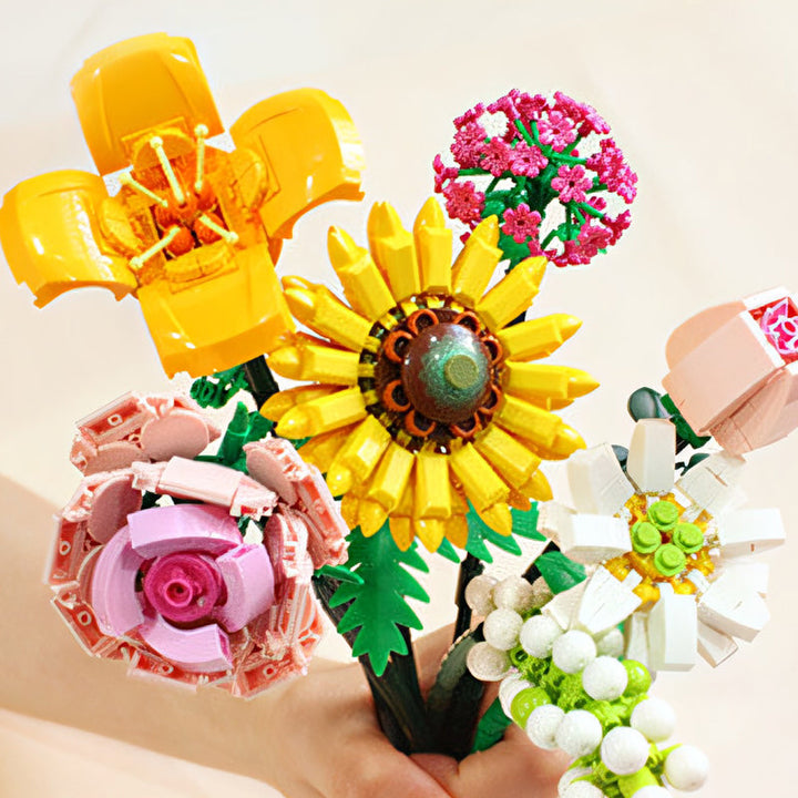 Assembled botanical building block bouquet, vibrant plastic flowers for home decoration.