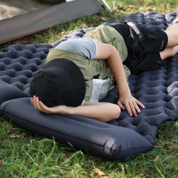Portable 2-person inflatable air mattress for camping, hiking, travel. Lightweight comfort.