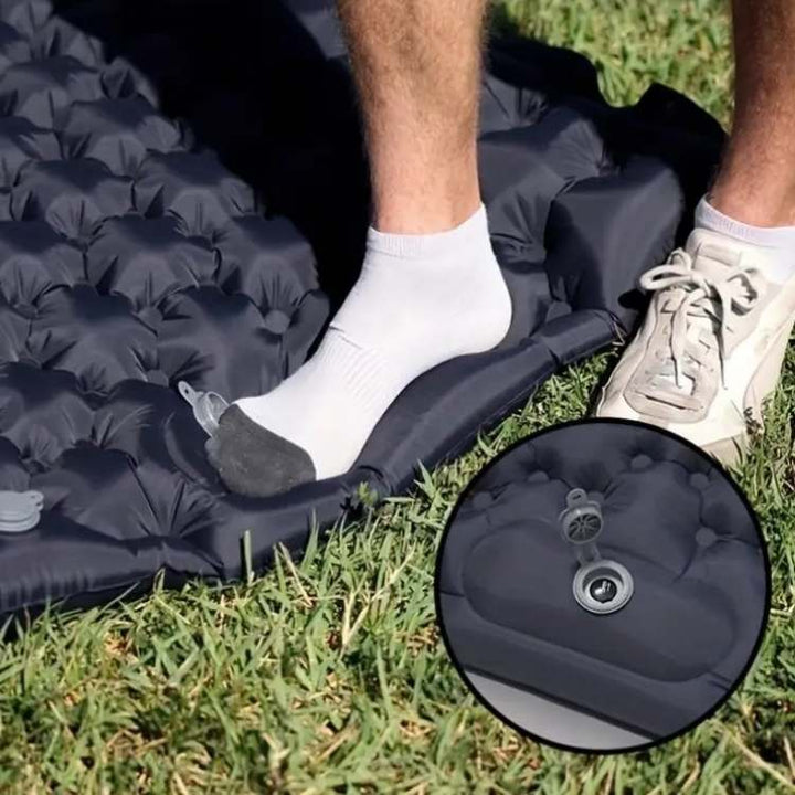 Durable double camping air mattress, 2-person sleeping pad. Lightweight & portable for outdoor adventures.