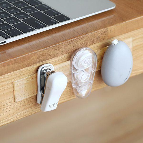 Double-sided nano adhesive tape, clear and strong grip for versatile household mounting, 125 characters