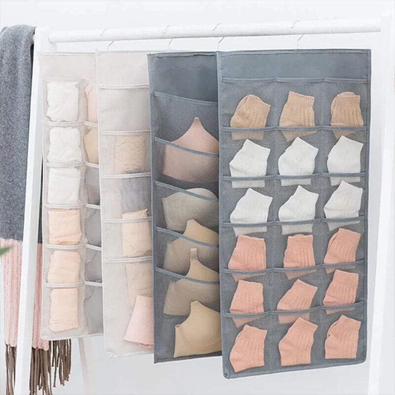 Wardrobe tidy solution: a dual-sided hanging organizer with clear mesh pockets for easy viewing.