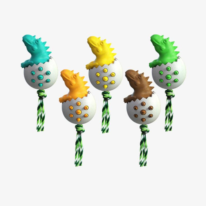 Collection of colorful dinosaur egg chew toys for dogs, showcasing a variety of pet supplies.