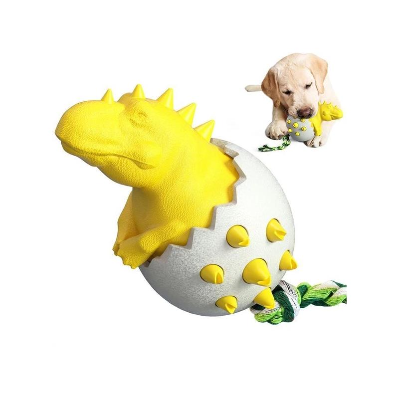 Dog happily chewing on a blue dinosaur egg toy, demonstrating its appeal as an interactive pet toy.