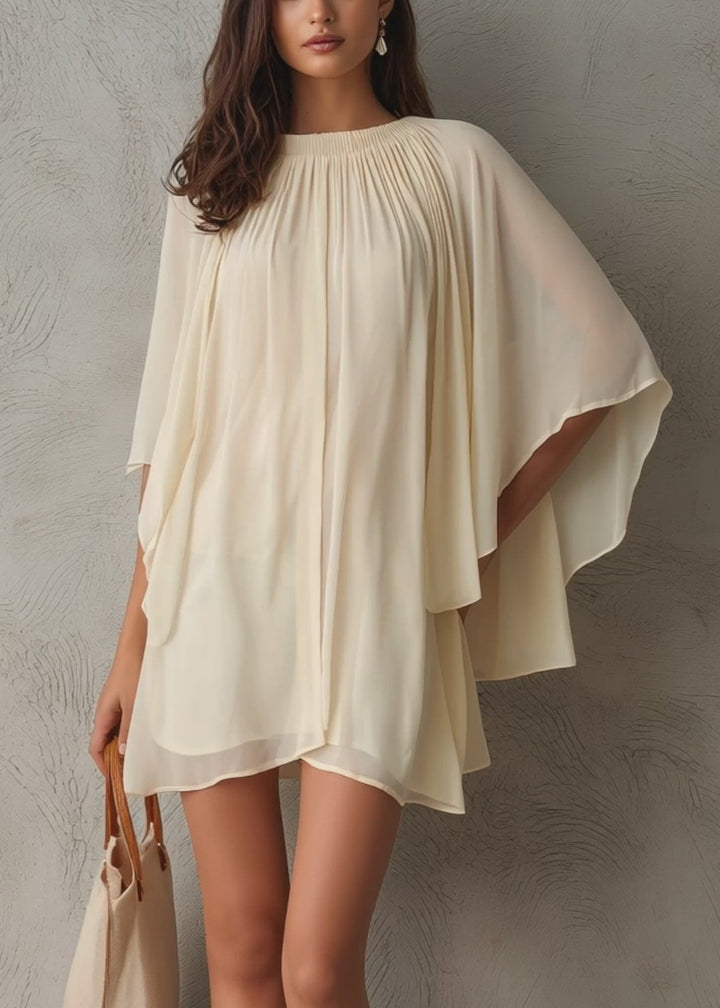 Stylish beige mini dress for women, featuring a flattering A-line silhouette, unique cape sleeves, and a gathered neck.