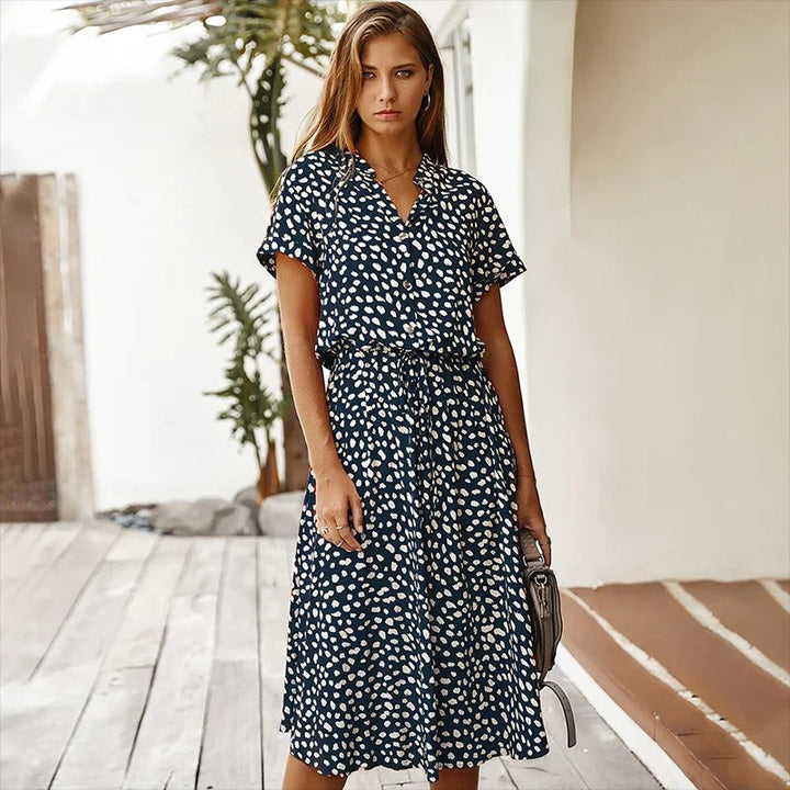 Women's casual flowy midi dress in a chic print, perfect for summer fashion, everyday style, and vacation.