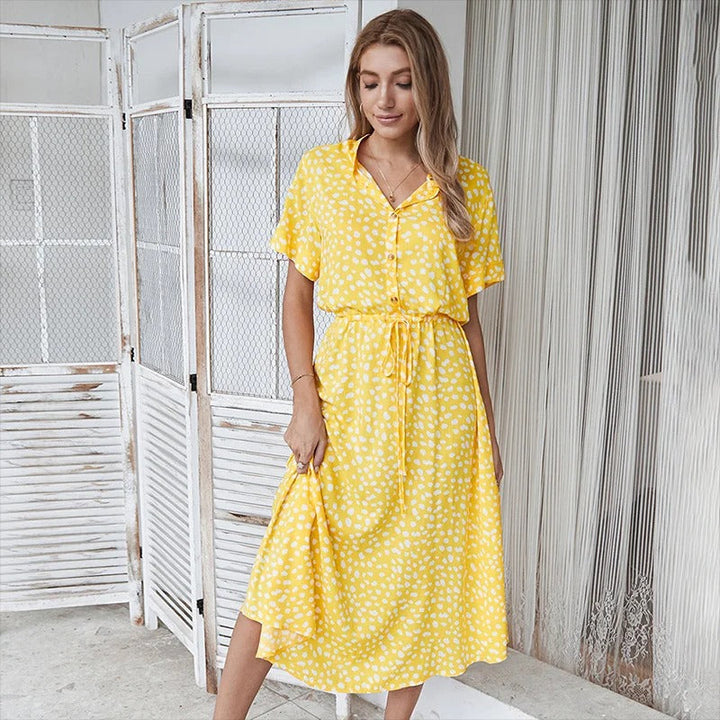 Comfortable women's printed summer midi dress, an effortless and elegant choice for any warm weather occasion.
