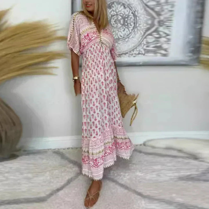 Stylish women's casual boho print maxi dress with a loose fit and V-neck, ideal for summer and vacation wear.