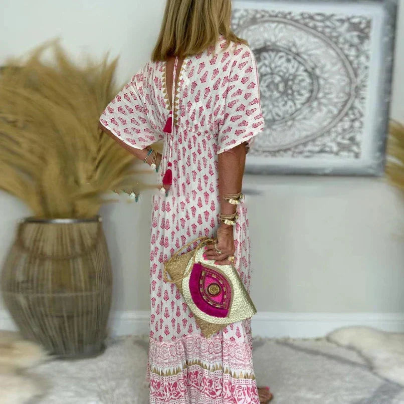 Elegant women's boho print maxi dress, a flowing V-neck style perfect for spring fashion, comfort, and casual wear.