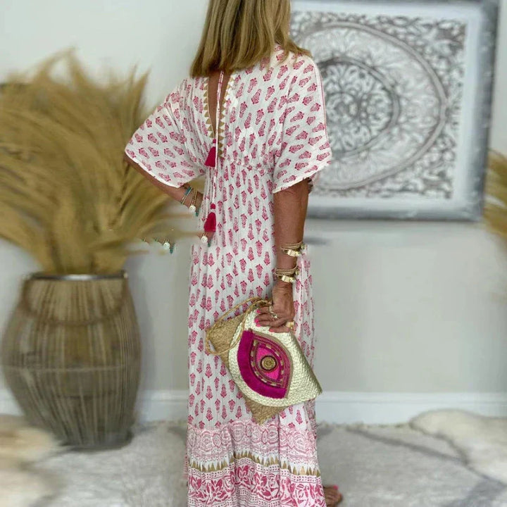 Elegant women's boho print maxi dress, a flowing V-neck style perfect for spring fashion, comfort, and casual wear.