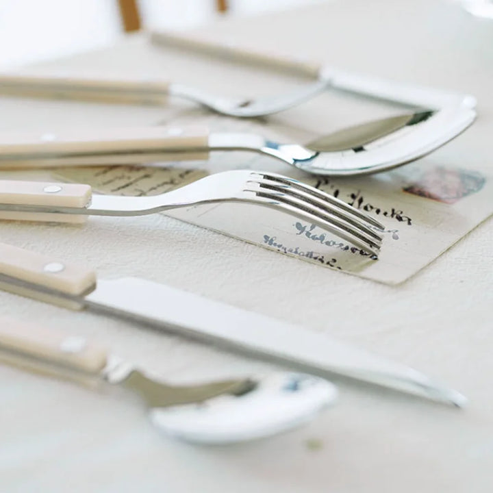 Complete 24-piece elegant engraved cutlery set for stylish kitchen and dining table settings.