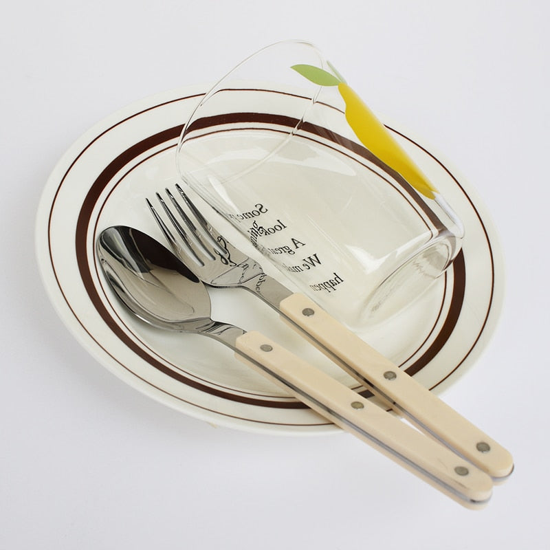 Beautiful 24-piece flatware set with an elegant engraved design, perfect for sophisticated mealtime.