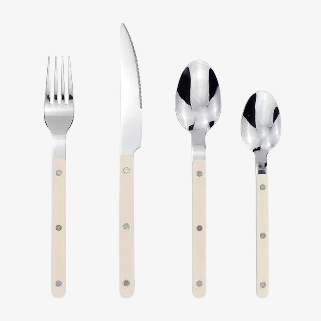 Modern 24-piece stainless steel cutlery set, elegantly engraved, suitable for any dining occasion.