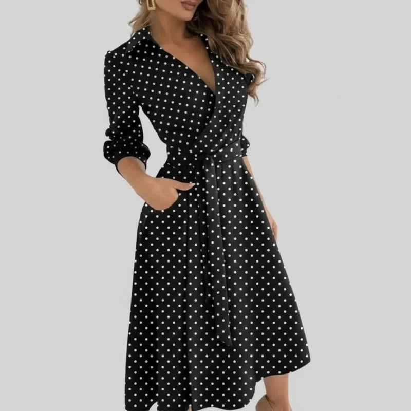 Women's V-neck A-line midi dress with a cinched belt & 3/4 sleeves for elegant style.