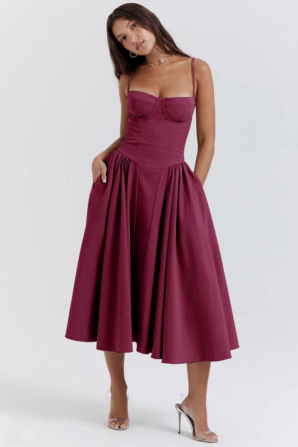 Formal women's evening gown, an Amara pleated midi dress with an elegant, flowing silhouette.