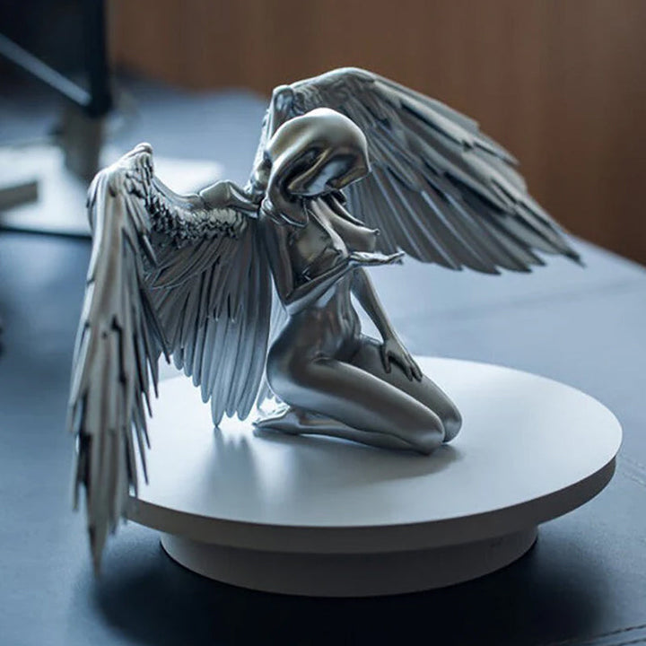 Elegant angel wings kneeling figure in white resin, perfect for spiritual home decor