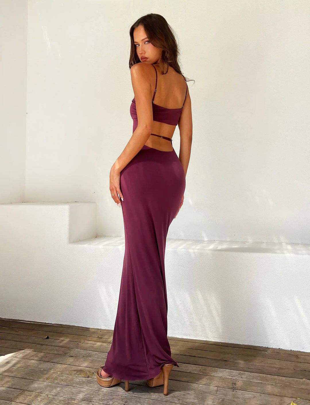 Dazzling backless strapless maxi gown, a women's elegant dress for special events.