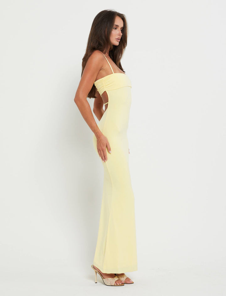 Women's elegant strapless backless long gown, ideal for formal occasions.