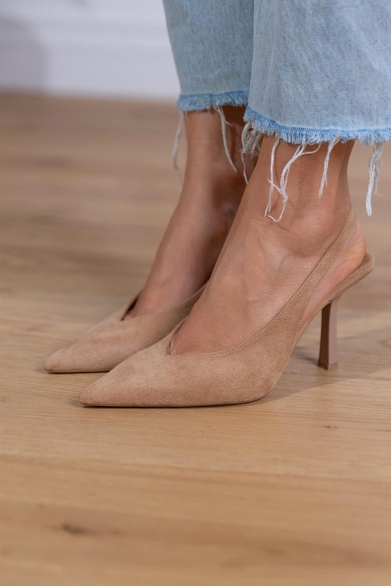 Elegant beige women's orthopedic slingback heels with pointed toe for stylish comfort and foot support.