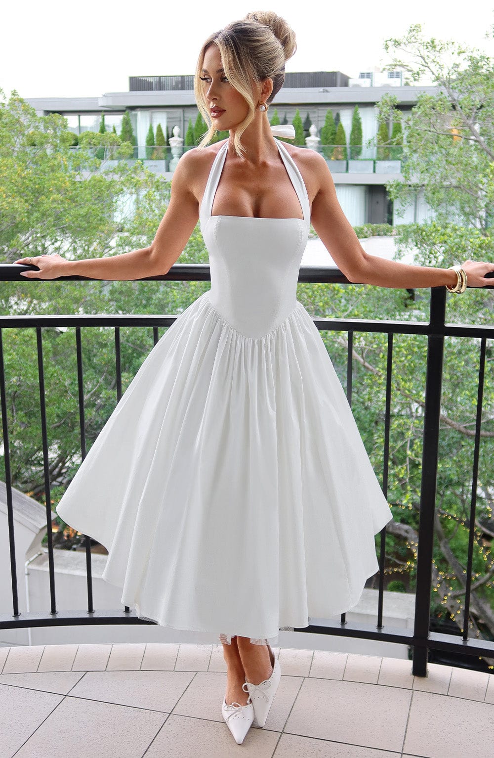 Elegant black halter neck midi dress for women, perfect formal wedding guest or special occasion wear