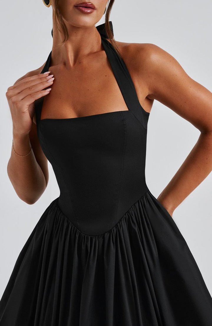 Black halter neck midi dress for women, an elegant and timeless piece for any special occasion