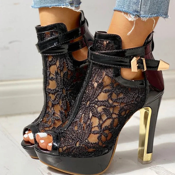Women's party-ready black platform high heels, featuring an elegant lace upper and high stiletto.