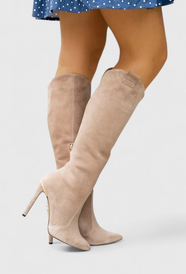 Chic women's heeled knee high boots with a sleek pointed toe, ideal for an elegant look