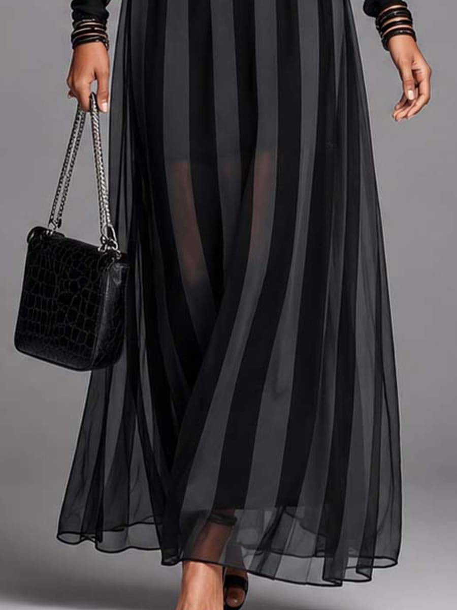 Chic black maxi evening dress for women, featuring elegant sheer sleeves & a sophisticated long-sleeve design.