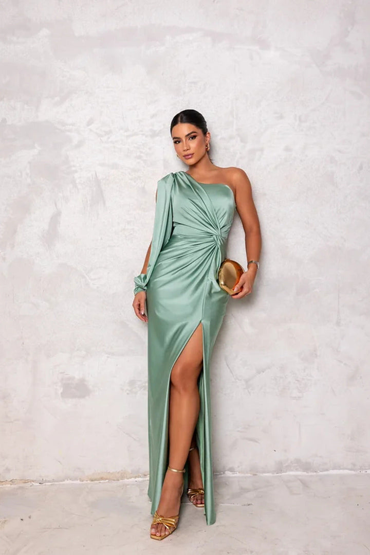 Emerald green one-shoulder ruched wedding guest dress, elegant and flattering for women.