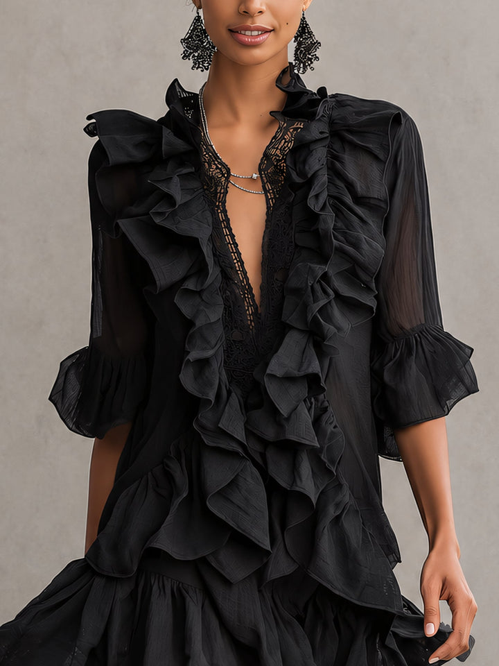 Stylish black mini dress for women featuring tiered ruffles, a flattering V-neck, and chic sheer sleeves.