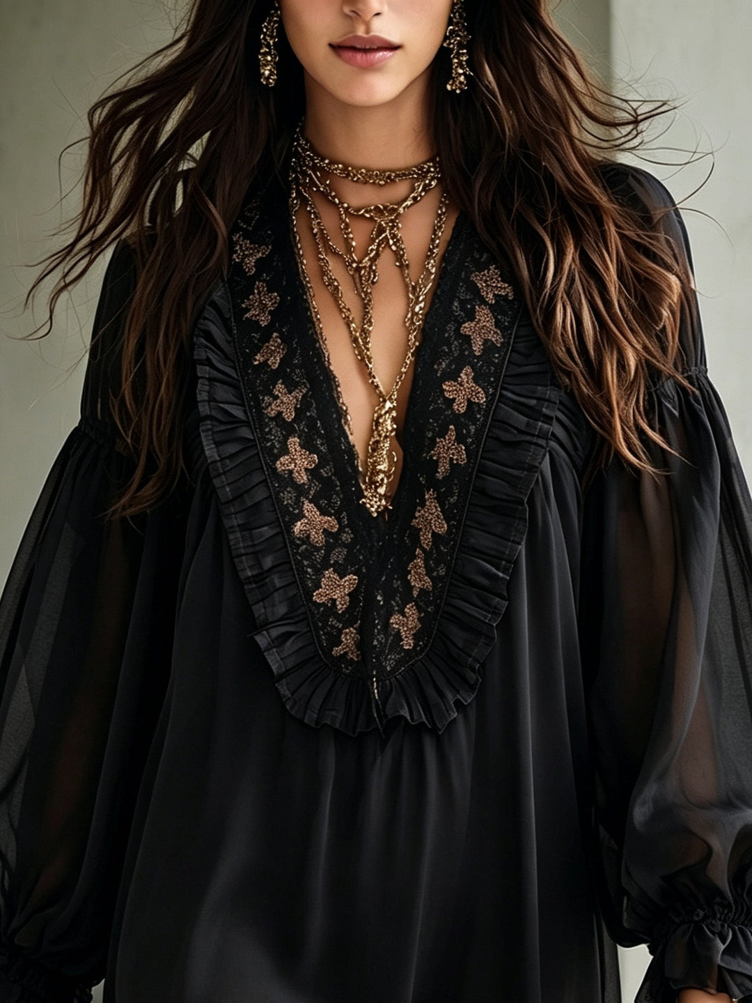 Women's elegant black V-neck mini dress featuring fashionable balloon sleeves. Ideal for cocktail parties or date nights.