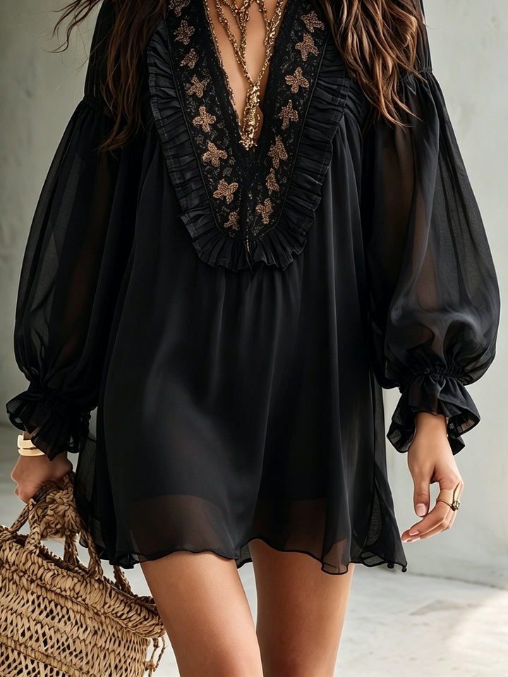 Boho-chic black V-neck mini dress with elegant balloon sleeves. Women's flowy party dress, perfect for evening wear.