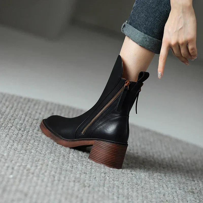 Versatile brown block heel ankle boots for women, featuring a comfortable design and convenient zipper.