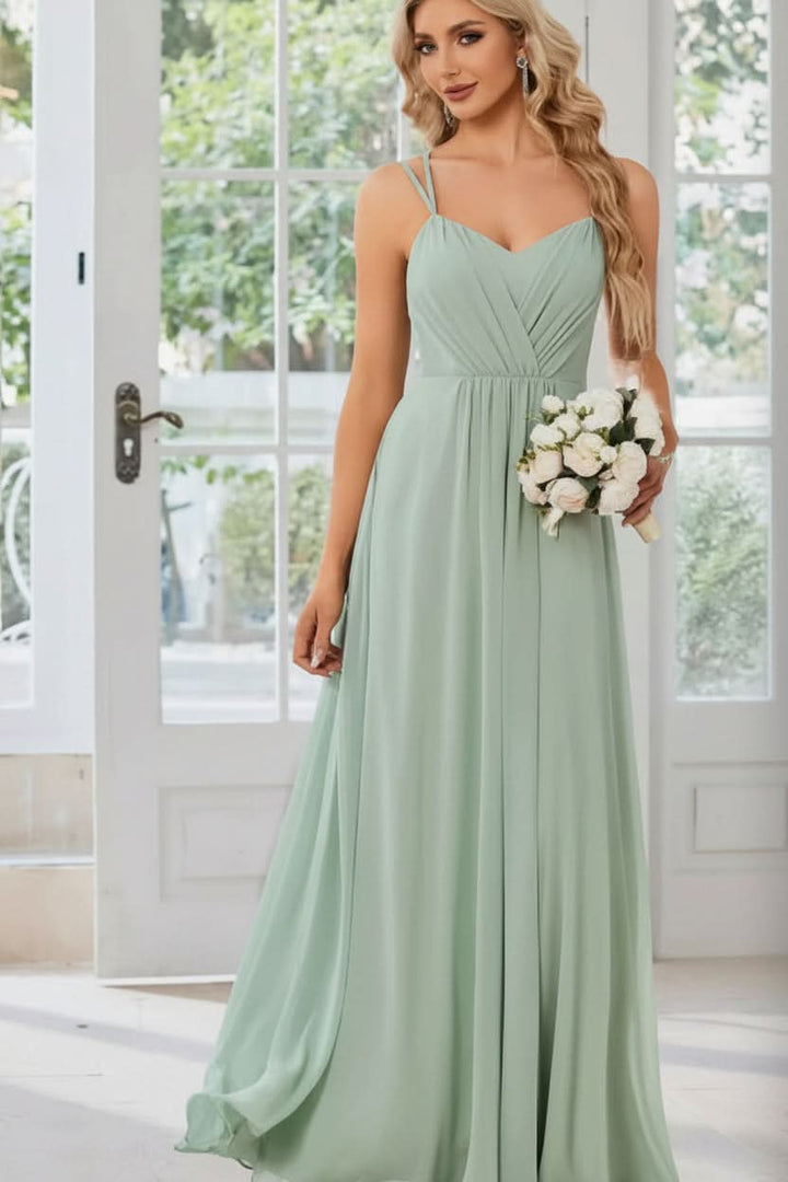 Gorgeous blue halter neck maxi dress with a keyhole cutout, perfect for women's formal or evening wear.