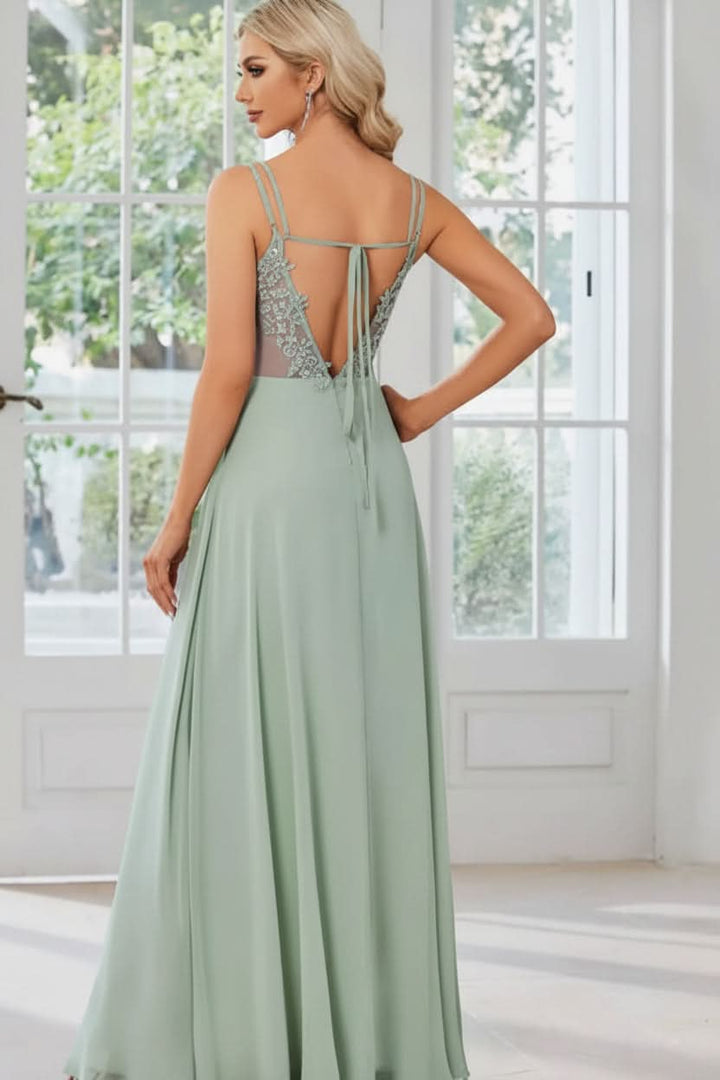 Chic women's blue halter neck keyhole formal gown. Elegant A-line maxi dress for special occasions.