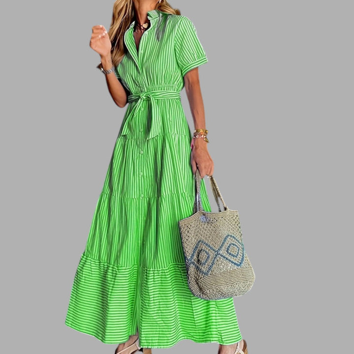Elegant blue maxi dress for women, perfect for formal wear & special occasions. Features a timeless flowing silhouette.