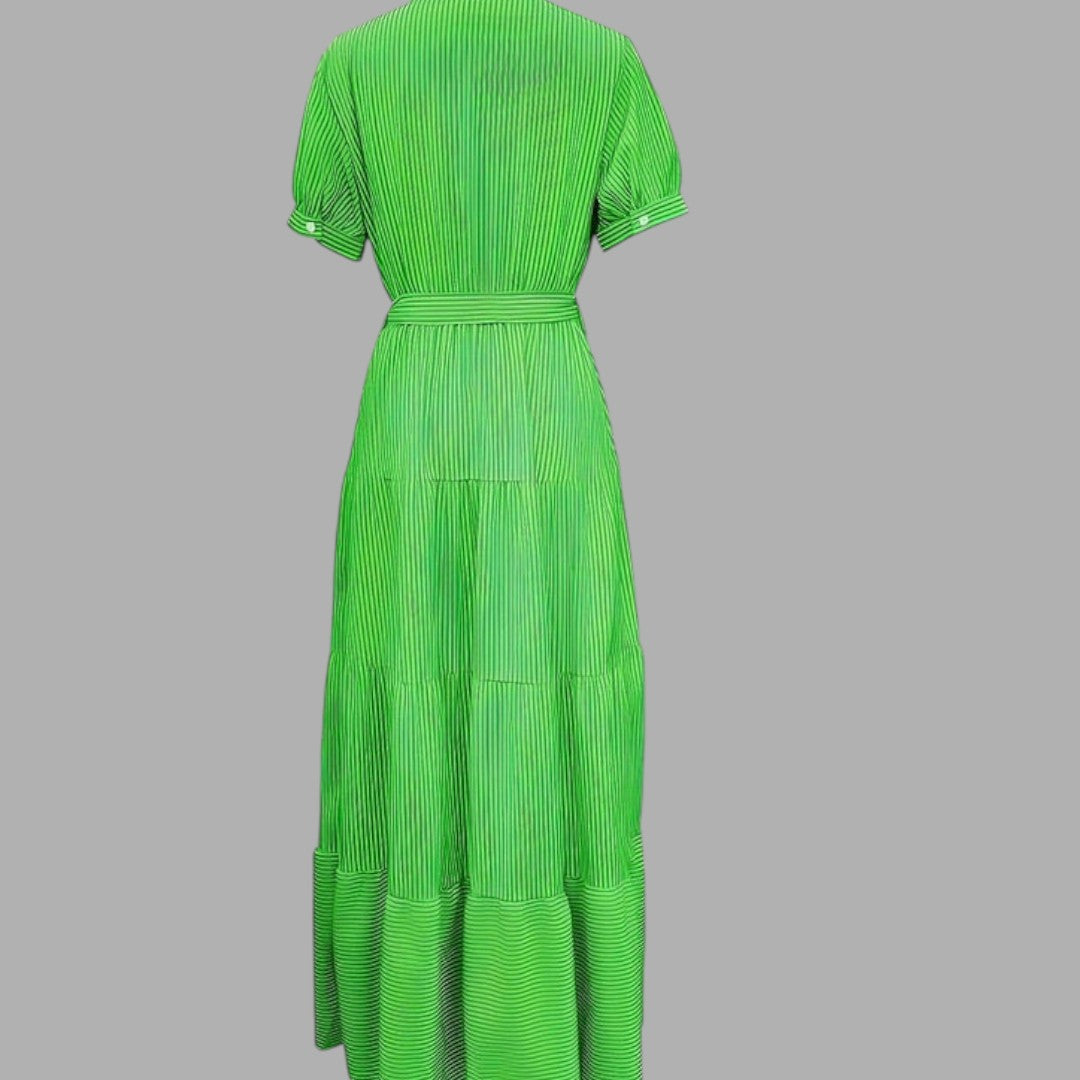 Timeless green maxi dress with a flowing silhouette, ideal for women's formal wear or evening events.