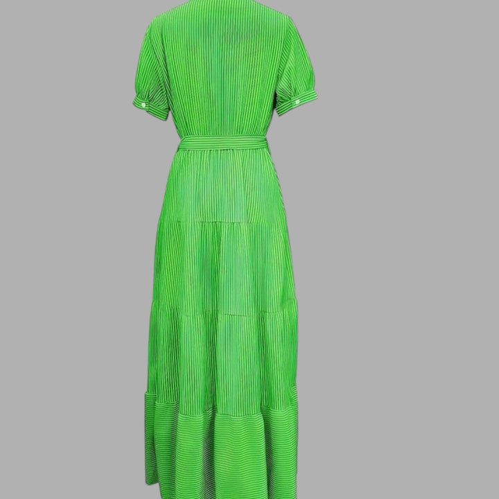 Timeless green maxi dress with a flowing silhouette, ideal for women's formal wear or evening events.