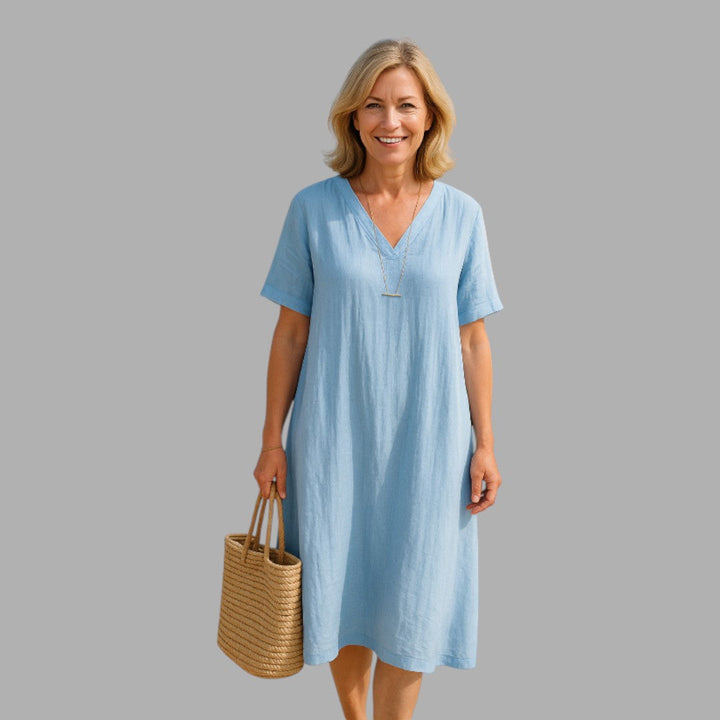 Elegant blue midi dress for women, perfect for semi-formal social occasions & party wear.