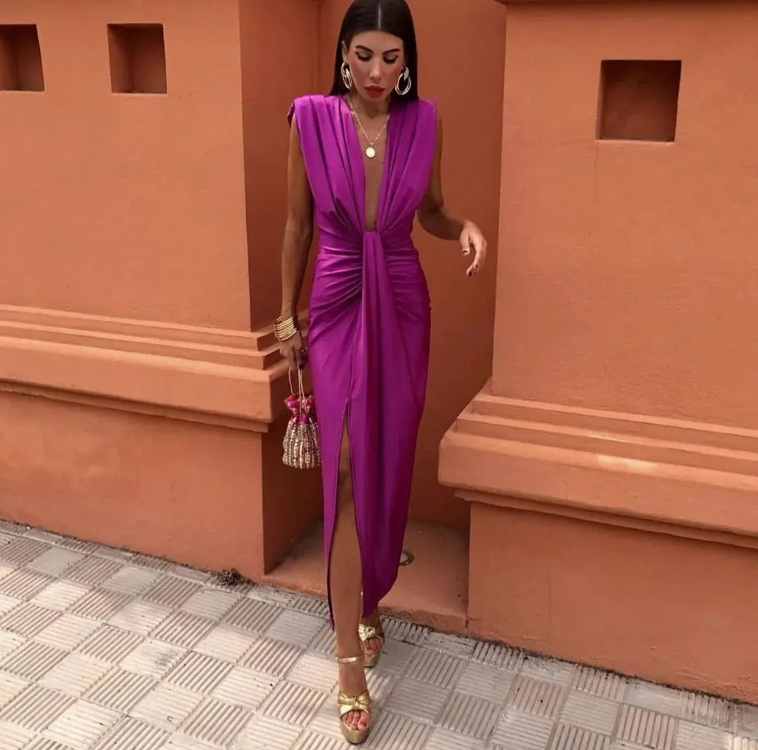 Chic fuchsia V-neck twist front maxi dress, ideal formal evening wear for wedding guests and special occasions.