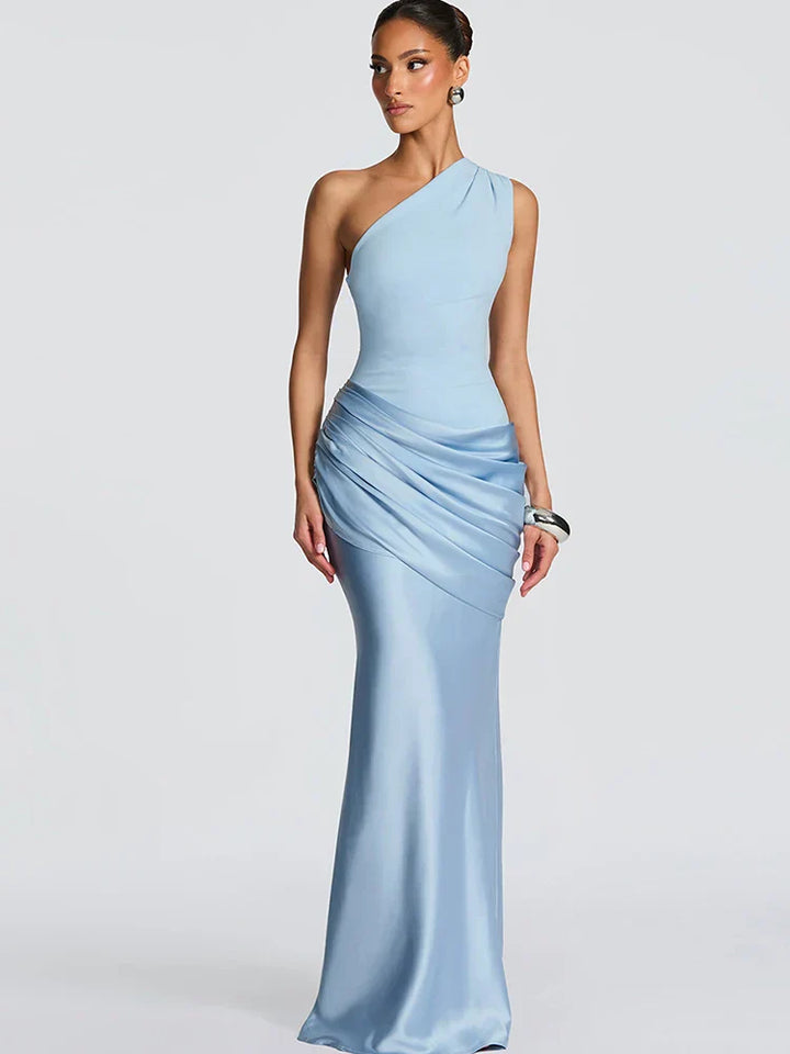 Blue one-shoulder maxi dress with asymmetrical neckline, ideal for women's special occasion or evening party. Elegant and formal.