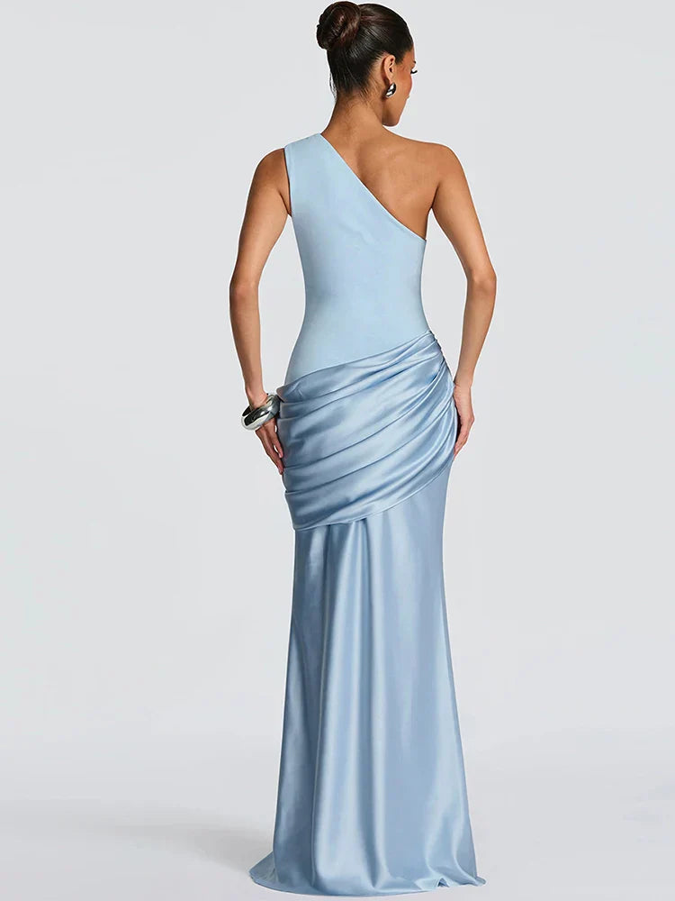Flowy one-shoulder maxi wedding guest dress for women. Elegant formal wear, perfect for special occasions & evening parties.